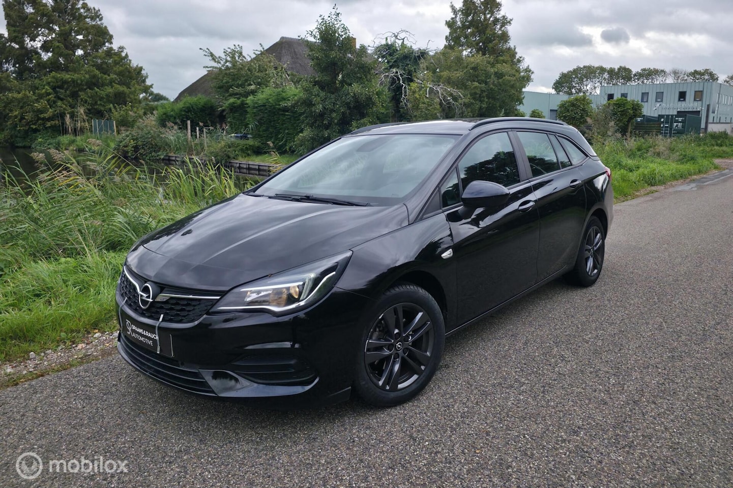 Opel Astra Sports Tourer - 1.2 Edition / Carplay / PDC - AutoWereld.nl