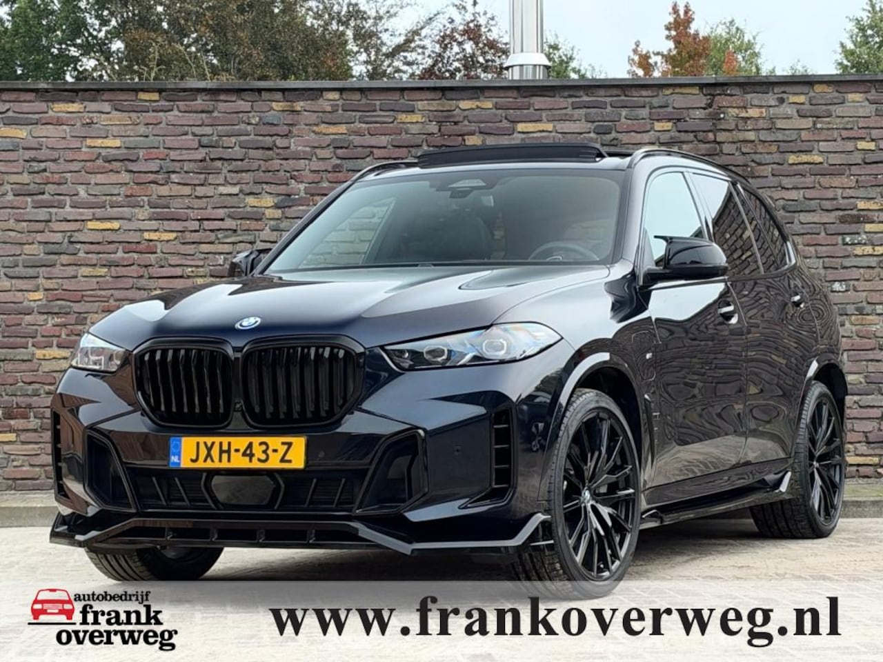 BMW X5 - XDRIVE50E M-Sport Sky lounge Luchtvering Panodak 22 Inch Head Up - AutoWereld.nl
