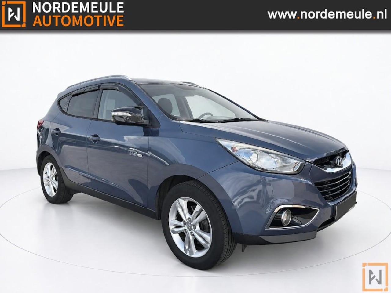 Hyundai ix35 - 1.6I GDI BUSINESS ED, TREKHAAK, CAMERA, CRUISE - AutoWereld.nl