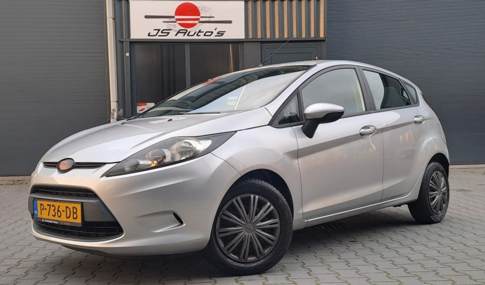 Ford Fiesta - 1.25 2010/5DRS/Airco/Navi/Cruise/Stoelverwarming/APK 04/2027 - AutoWereld.nl