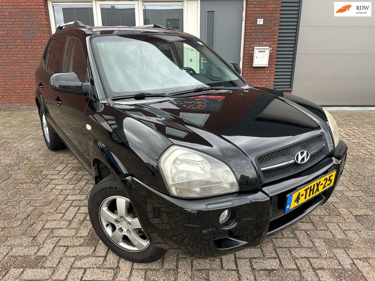 Hyundai Tucson - 2.0i Active / Leder / Stoelverw / clima / LM - AutoWereld.nl