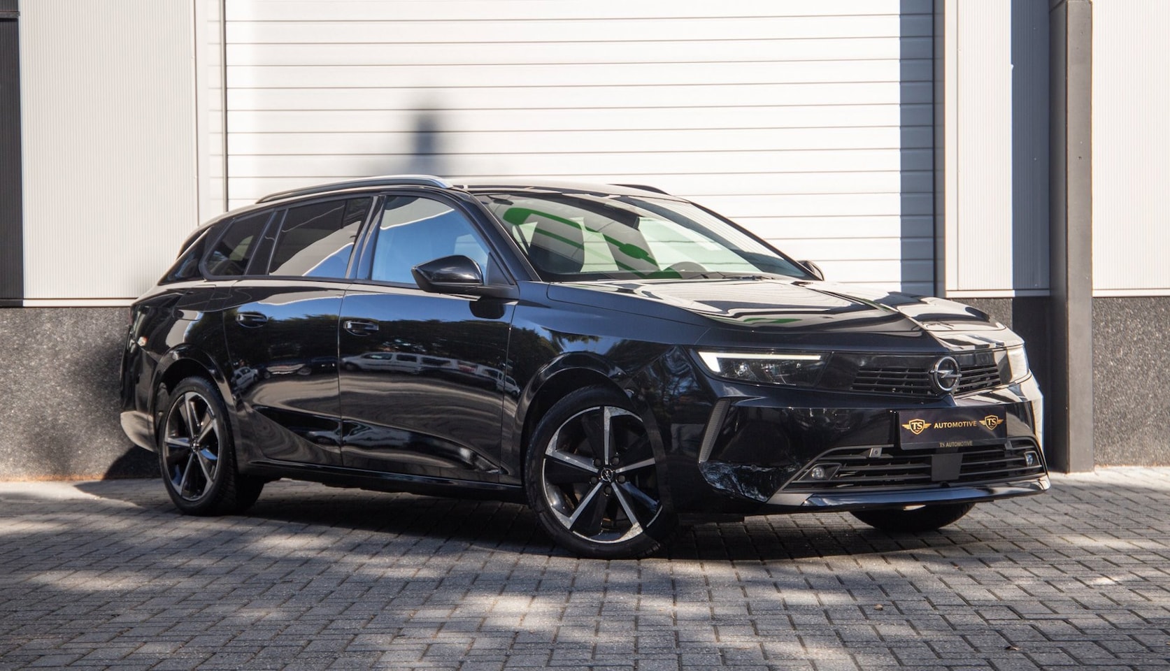 Opel Astra Sports Tourer - 1.6 Hybrid Elegance 1.6 Hybrid Elegance - AutoWereld.nl