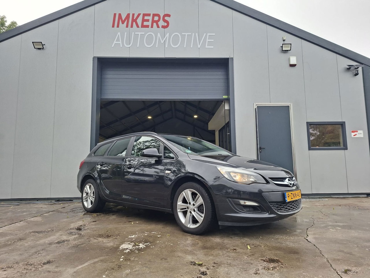 Opel Astra Sports Tourer - 1.7 CDTi Business + - AutoWereld.nl