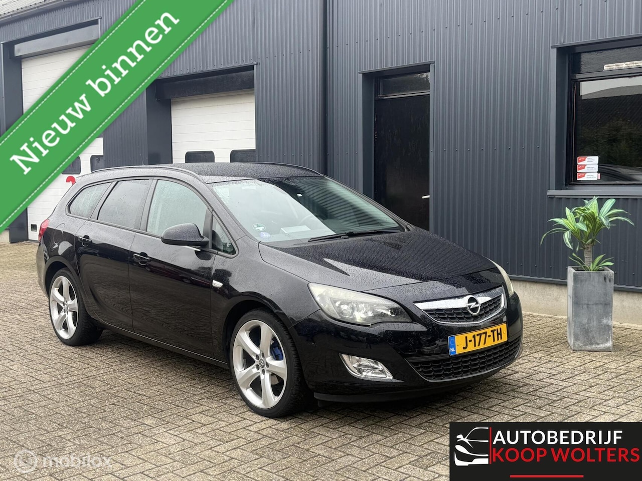 Opel Astra Sports Tourer - 1.4 Turbo Selection 1.4 Turbo Selection - AutoWereld.nl