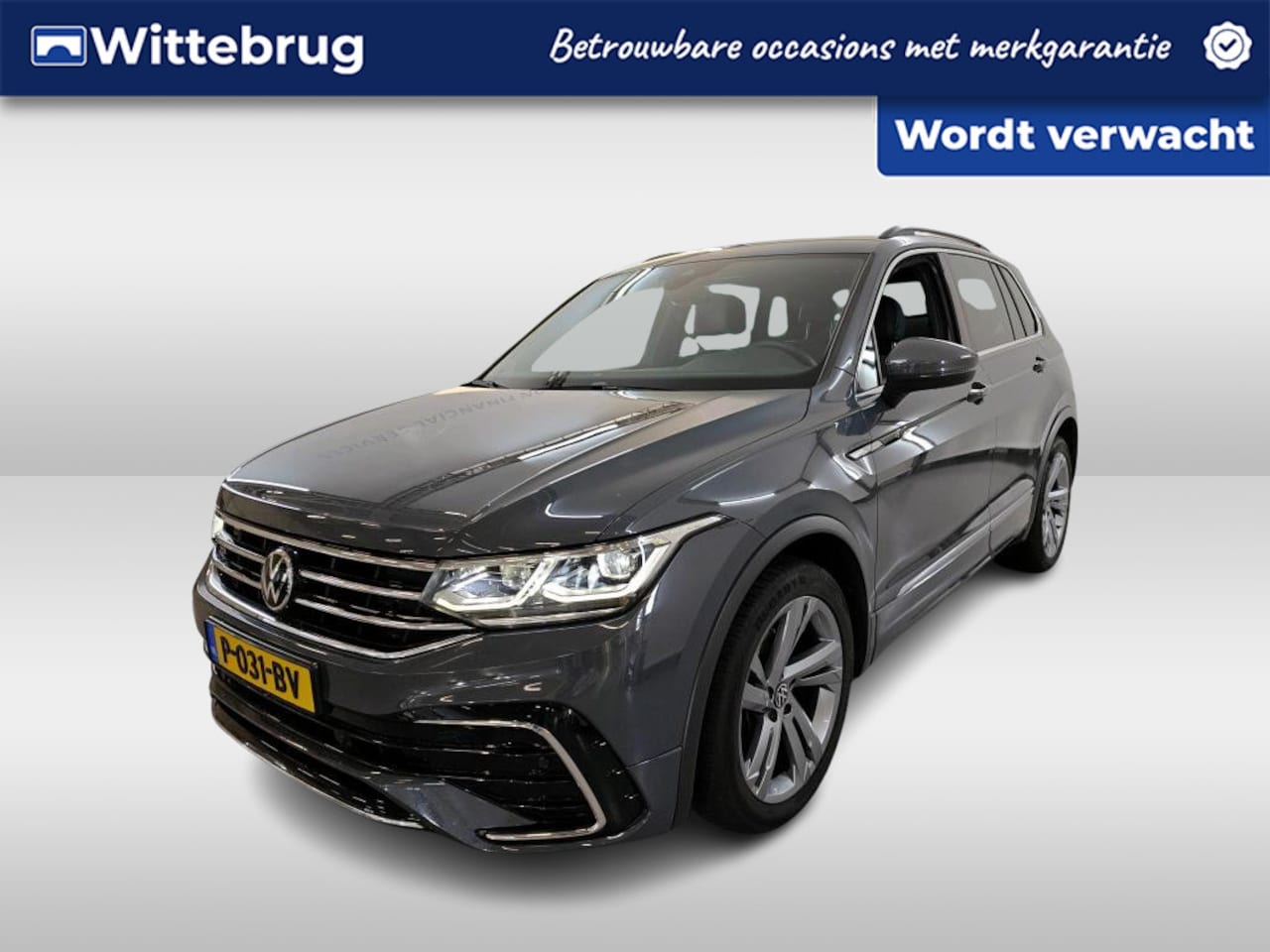 Volkswagen Tiguan - 1.5 TSI R-Line Business+ / AUTOMAAT/ NAVI/ DIGITAL DASH/ CLIMATE/ STOELVERWARMING/ PARK. S - AutoWereld.nl