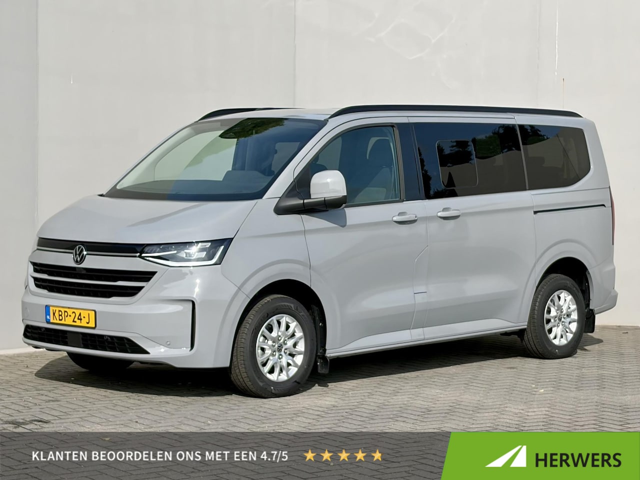 Volkswagen e-Transporter Caravelle - 32 L1H1 Life 64 kWh Automaat 8 PERSOONS / garantie tot 12-2027 / WLTP 305 km / Stone Gray - AutoWereld.nl