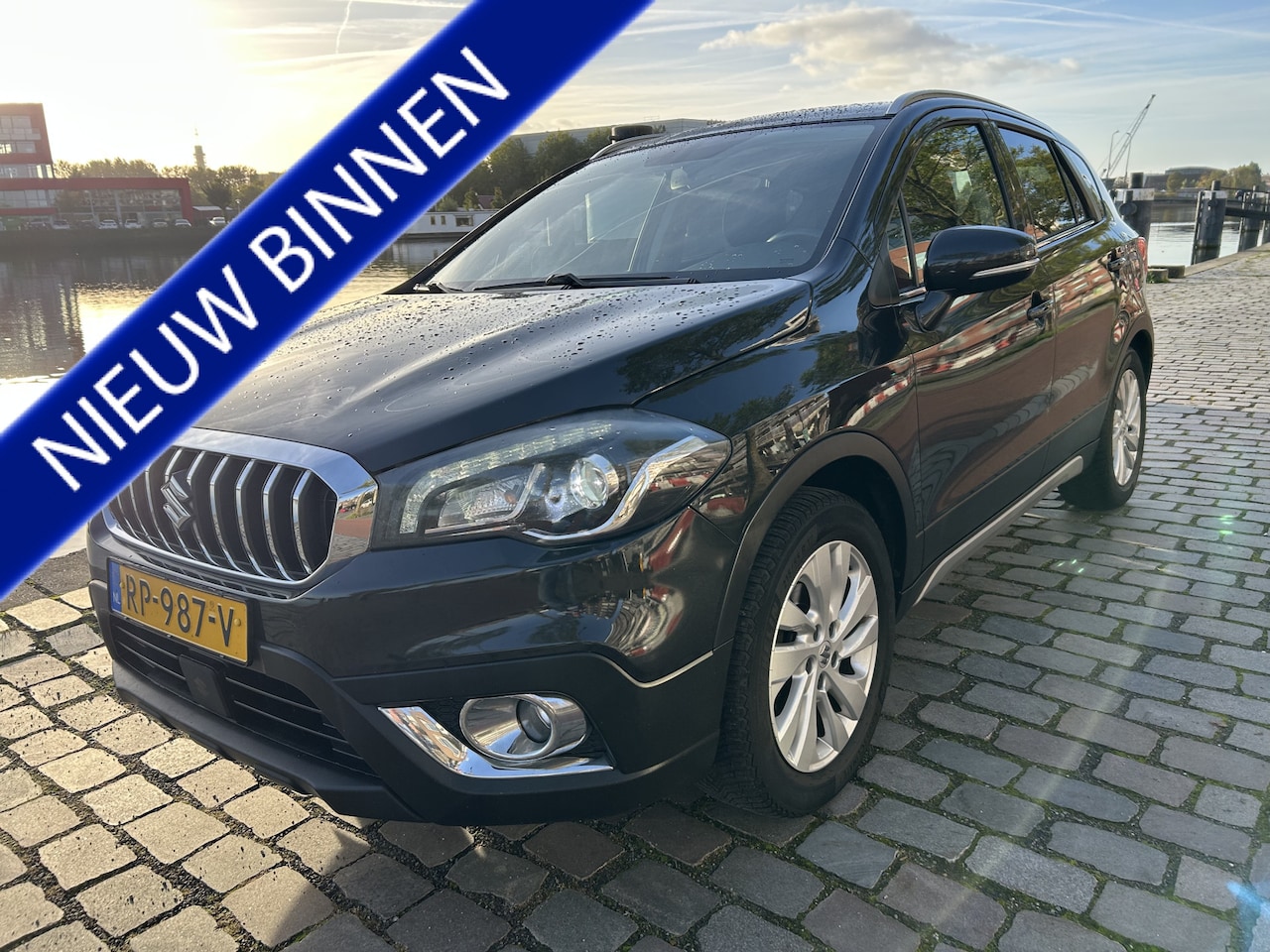 Suzuki S-Cross - 1.0 Boosterjet Exclusive airco/ecc navo/camera nieuwstaat - AutoWereld.nl