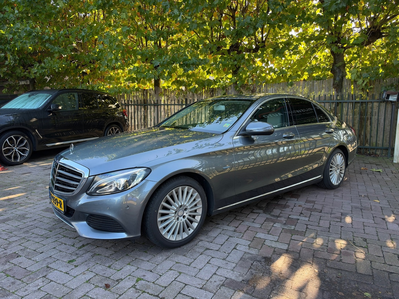 Mercedes-Benz C-klasse - 350 e Lease Ed. |NW APK|Navi|Clima|Cruise|Leder|PDC| - AutoWereld.nl