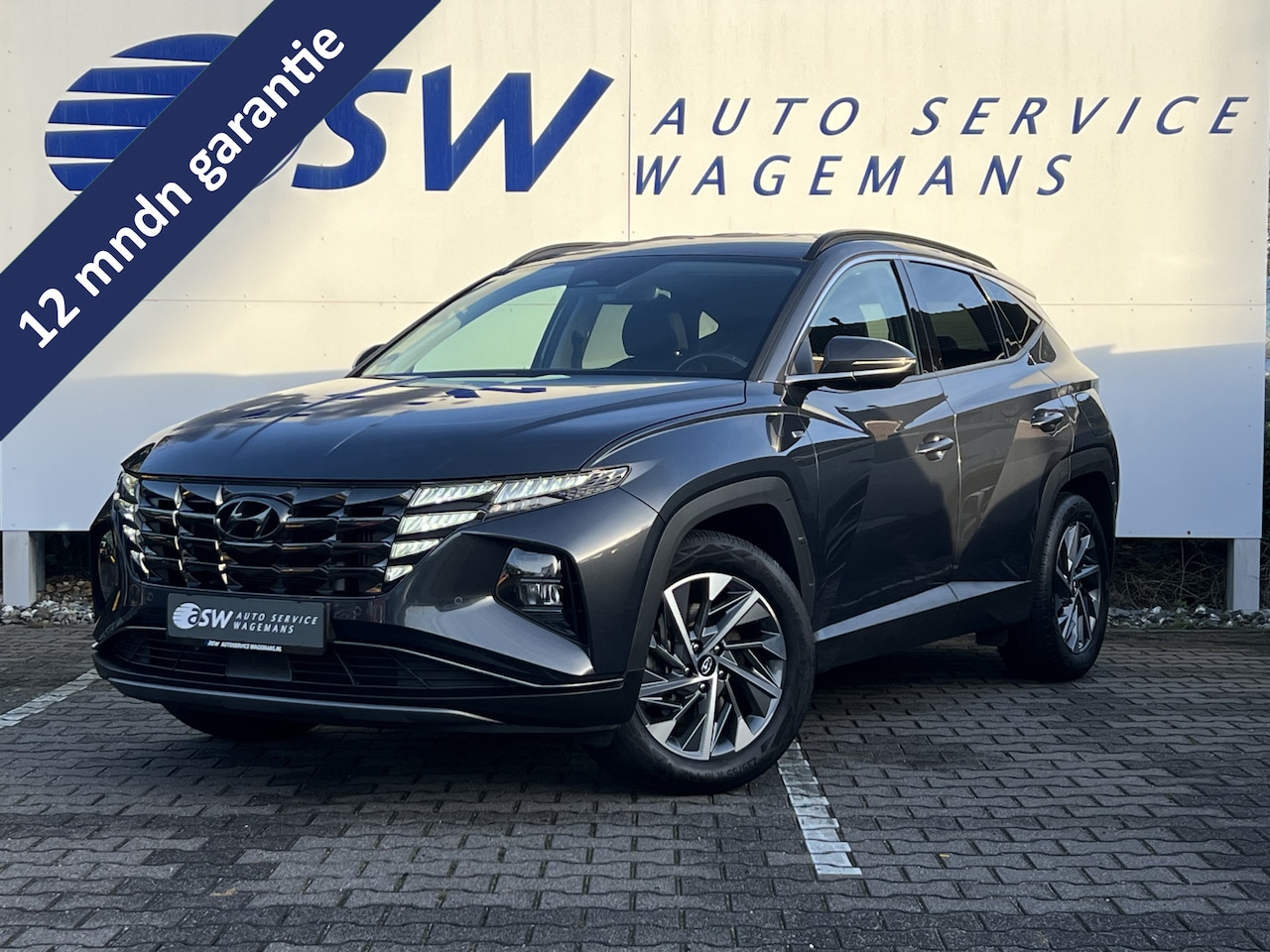 Hyundai Tucson - 1.6 T-GDI MHEV Comfort Smart | Trekhaak | Elek klep | Camera | LED | ACC - AutoWereld.nl