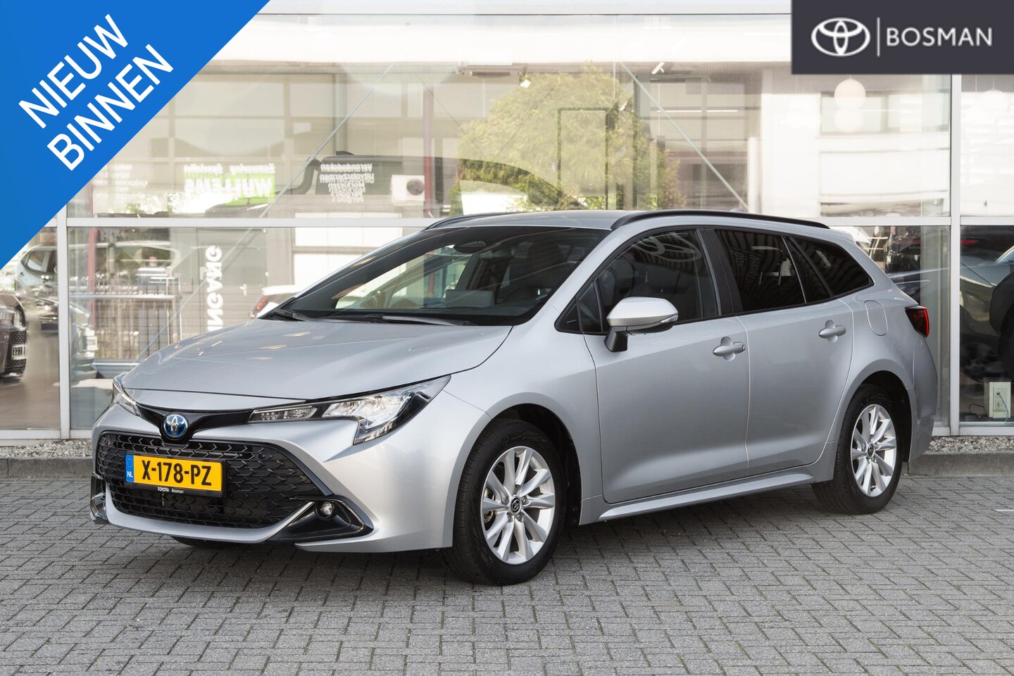 Toyota Corolla Touring Sports - Hybrid 140 Active - AutoWereld.nl