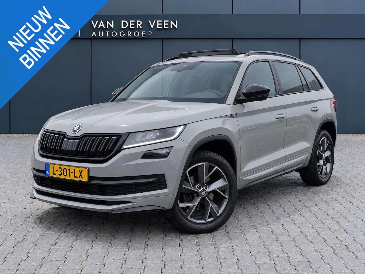 Skoda Kodiaq - 1.5 TSI Sportline Business 7p. Incl. 12 maanden garantie | Trekhaak | Schuif/kantel dak | - AutoWereld.nl