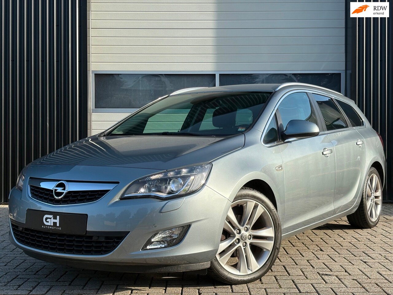 Opel Astra Sports Tourer - 1.4 Turbo Anniversary Edition 1.4 Turbo Anniversary Edition - AutoWereld.nl