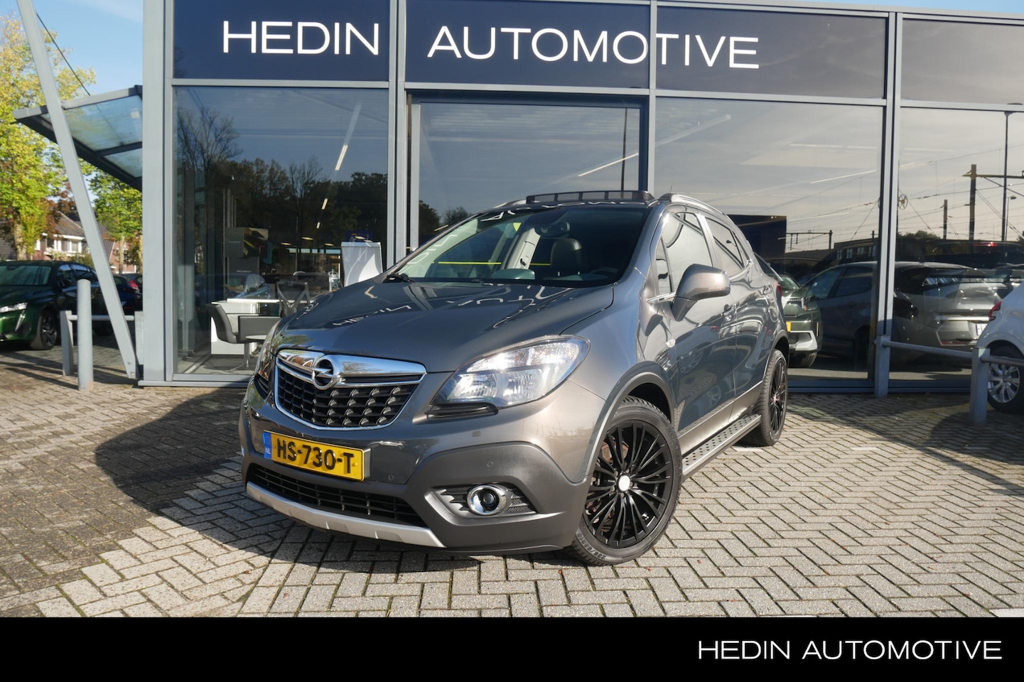 Opel Mokka - 1.4 T Cosmo | Schuif/Kantel Dak | Volledig Leer | Stoel/Stuur Verw. | Navigatie | All-Seas - AutoWereld.nl