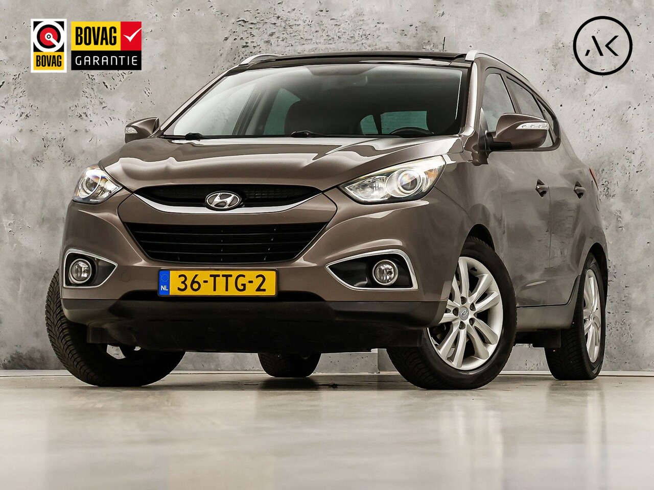 Hyundai ix35 - 2.0i i-Catcher 164Pk Automaat (PANORAMADAK, NAVIGATIE, CAMERA, LEDER, STOELVERWARMING ACHT - AutoWereld.nl