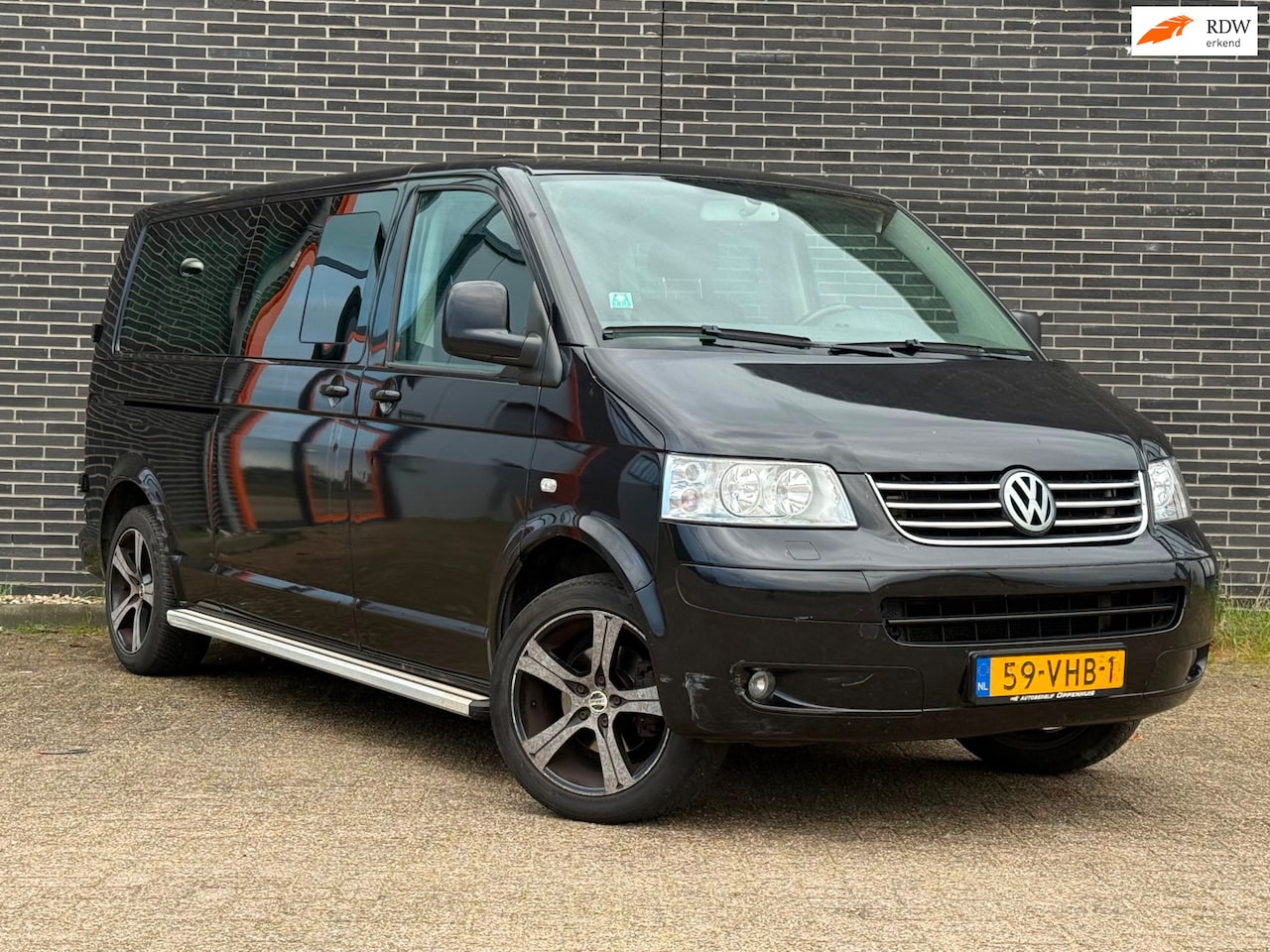 Volkswagen Transporter Caravelle - 2.5 TDI 340 Highline DC - AutoWereld.nl
