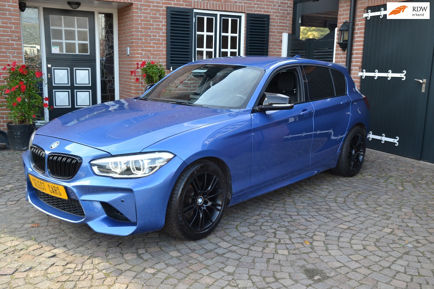 BMW 1-serie - 116i Edition M Sport Shadow High Executive - Airco - Leer - Navigatie - M-Pakket - Sterren - AutoWereld.nl