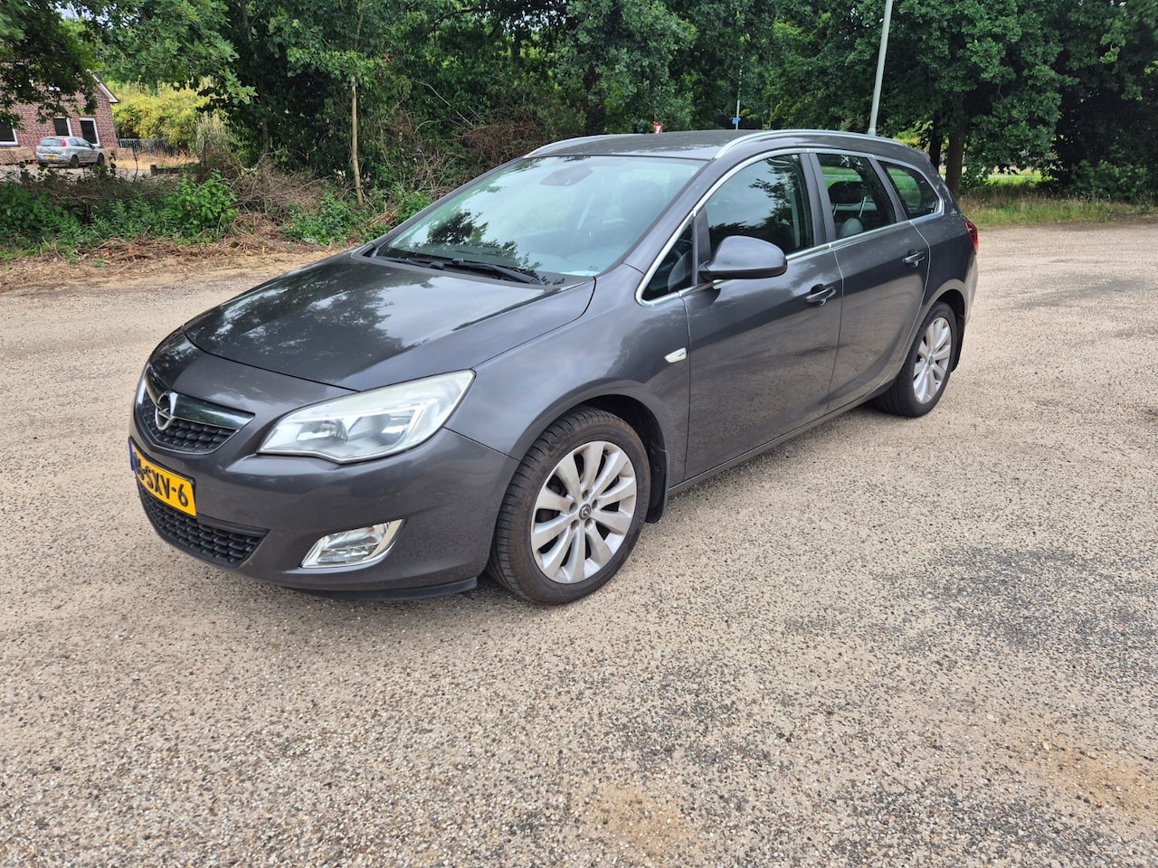 Opel Astra Sports Tourer - 1.4 Turbo Cosmo - AutoWereld.nl