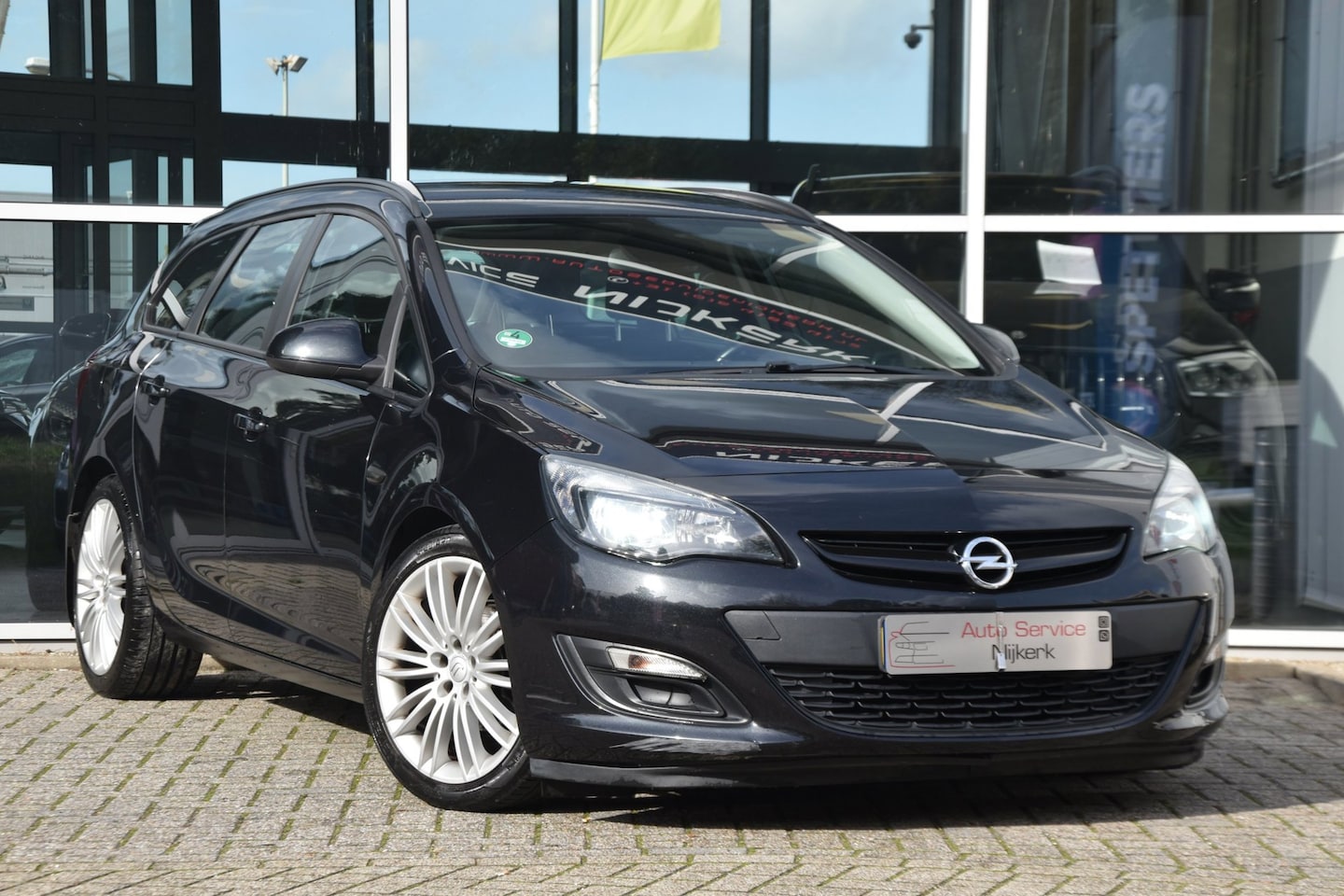 Opel Astra Sports Tourer - 1.4 Turbo Berlin Airco Pdc Nav. Trekhaak Cruise Lm-Velgen - AutoWereld.nl