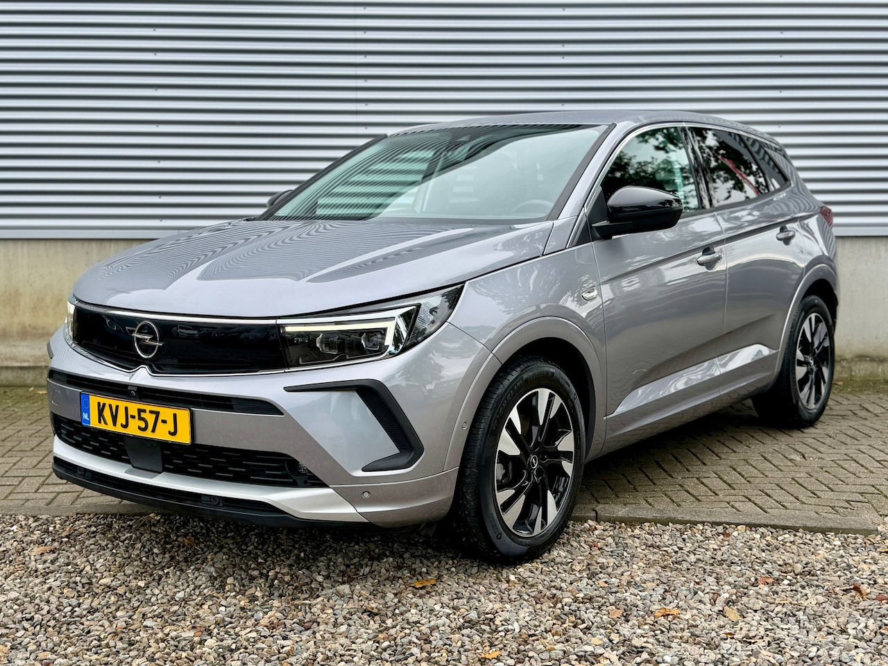 Opel Grandland - 1.2 Turbo 130pk Edition [ Fm navi,apple car,camera`s,ecc,cruise,18``lmv ] - AutoWereld.nl