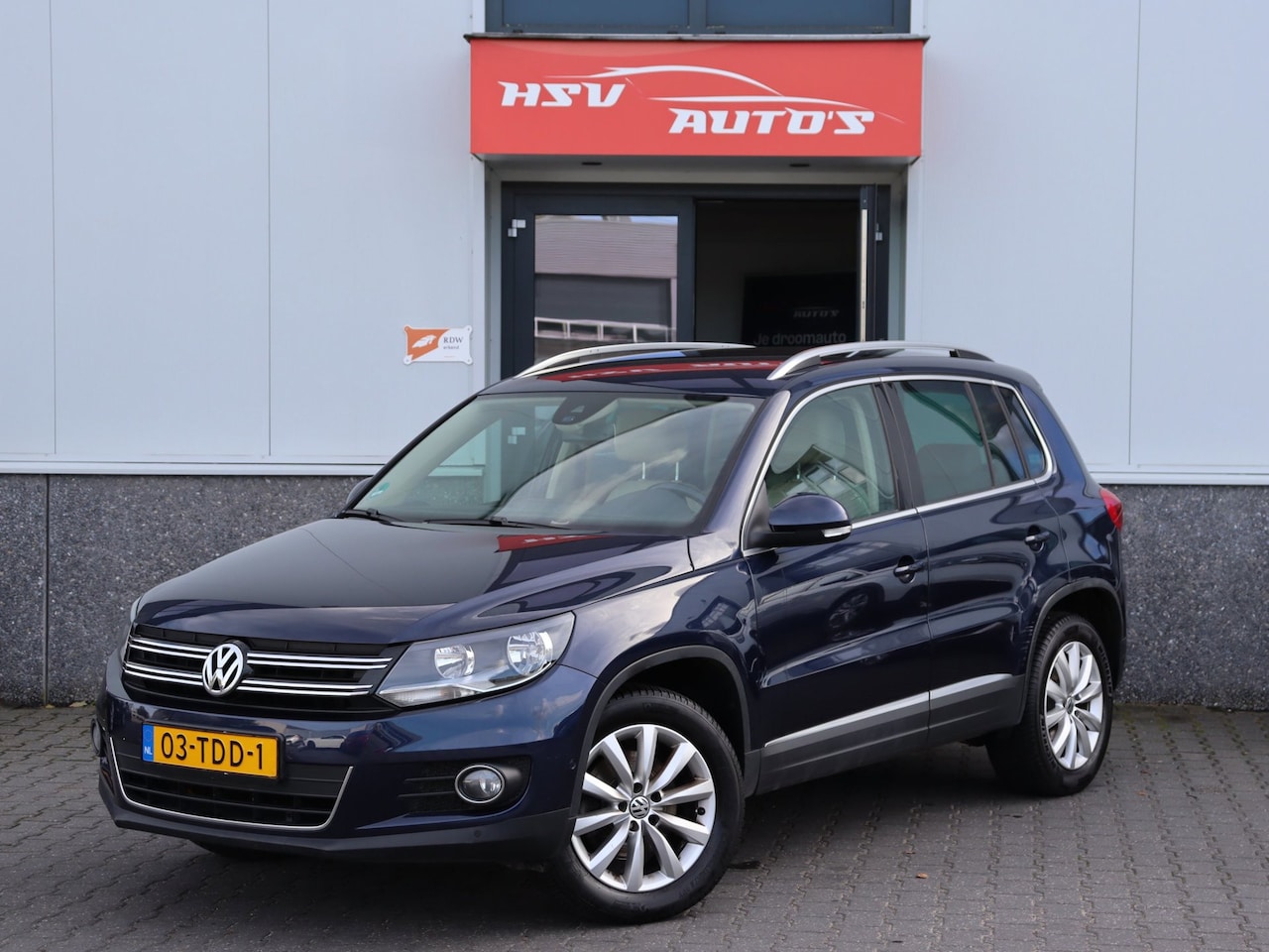 Volkswagen Tiguan - 2.0 TSI Sport&Style 4Motion - AutoWereld.nl