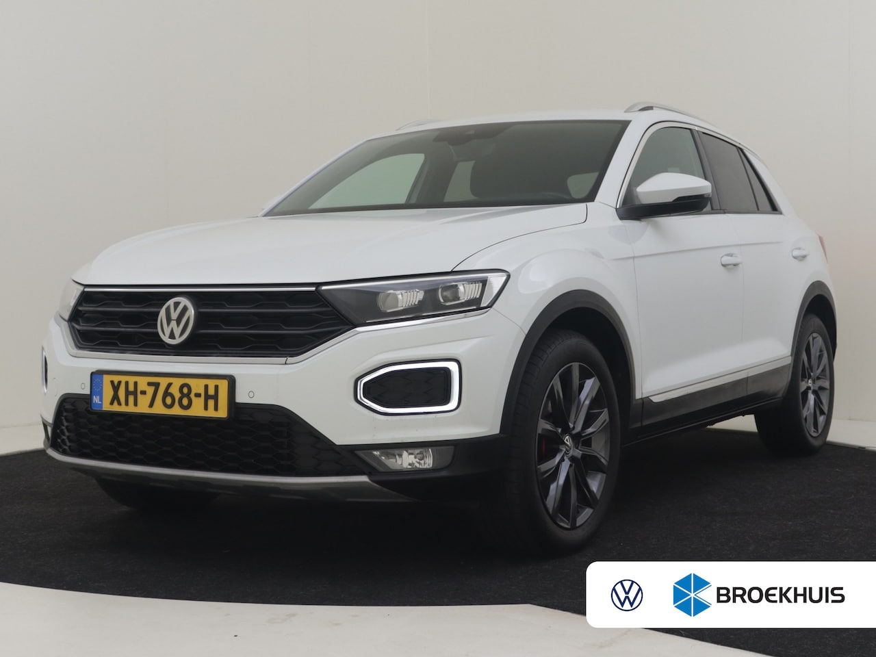 Volkswagen T-Roc - 1.5 TSI Sport l LED l Climate contr | Cruise contr adapt | Rode Remklauwen l Apple carplay - AutoWereld.nl