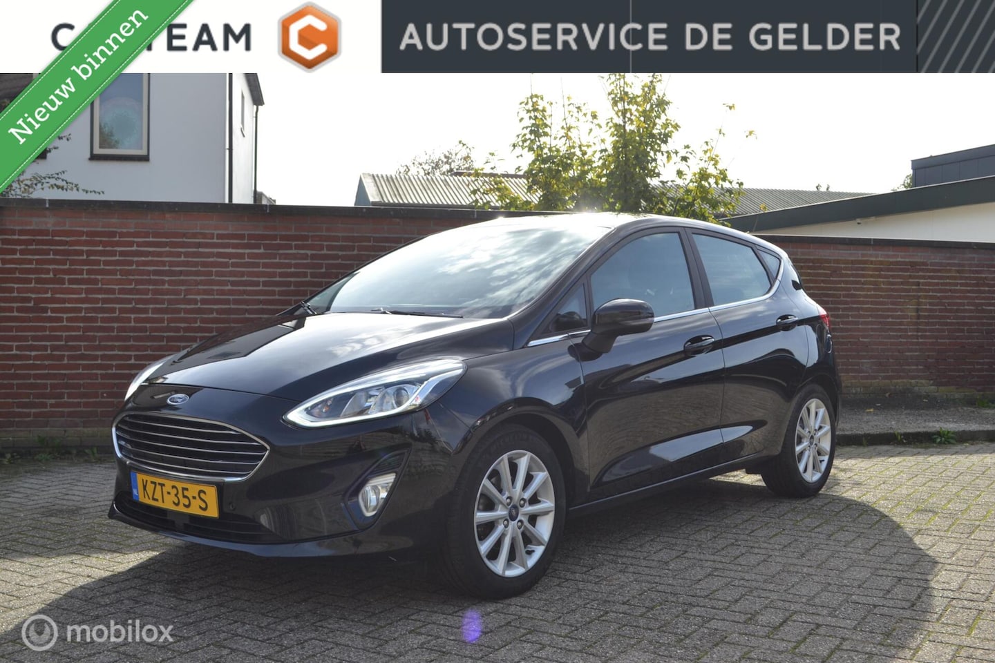 Ford Fiesta - 1.0 EcoBoost Titanium | Camera| Navigatie | Stoelverwarming| Automatisch inparkeren - AutoWereld.nl