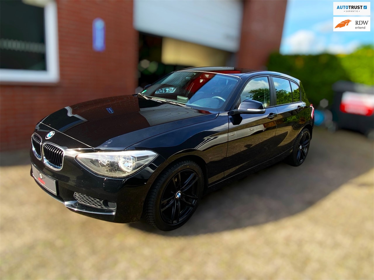 BMW 1-serie - 116i Sport 136PK/NAVI/PDC/Stoelverw. - AutoWereld.nl