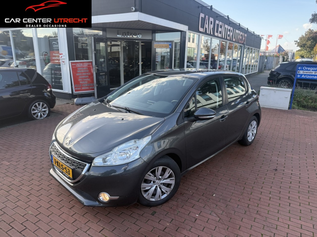 Peugeot 208 - 1.2 VTi Envy navi airco cruise control - AutoWereld.nl