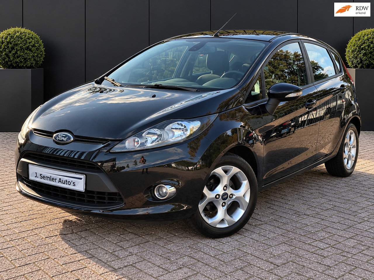 Ford Fiesta - 1.25 Titanium AIRCO CRUISE CTRL PARKEERSENSOREN 5 DEURS - AutoWereld.nl