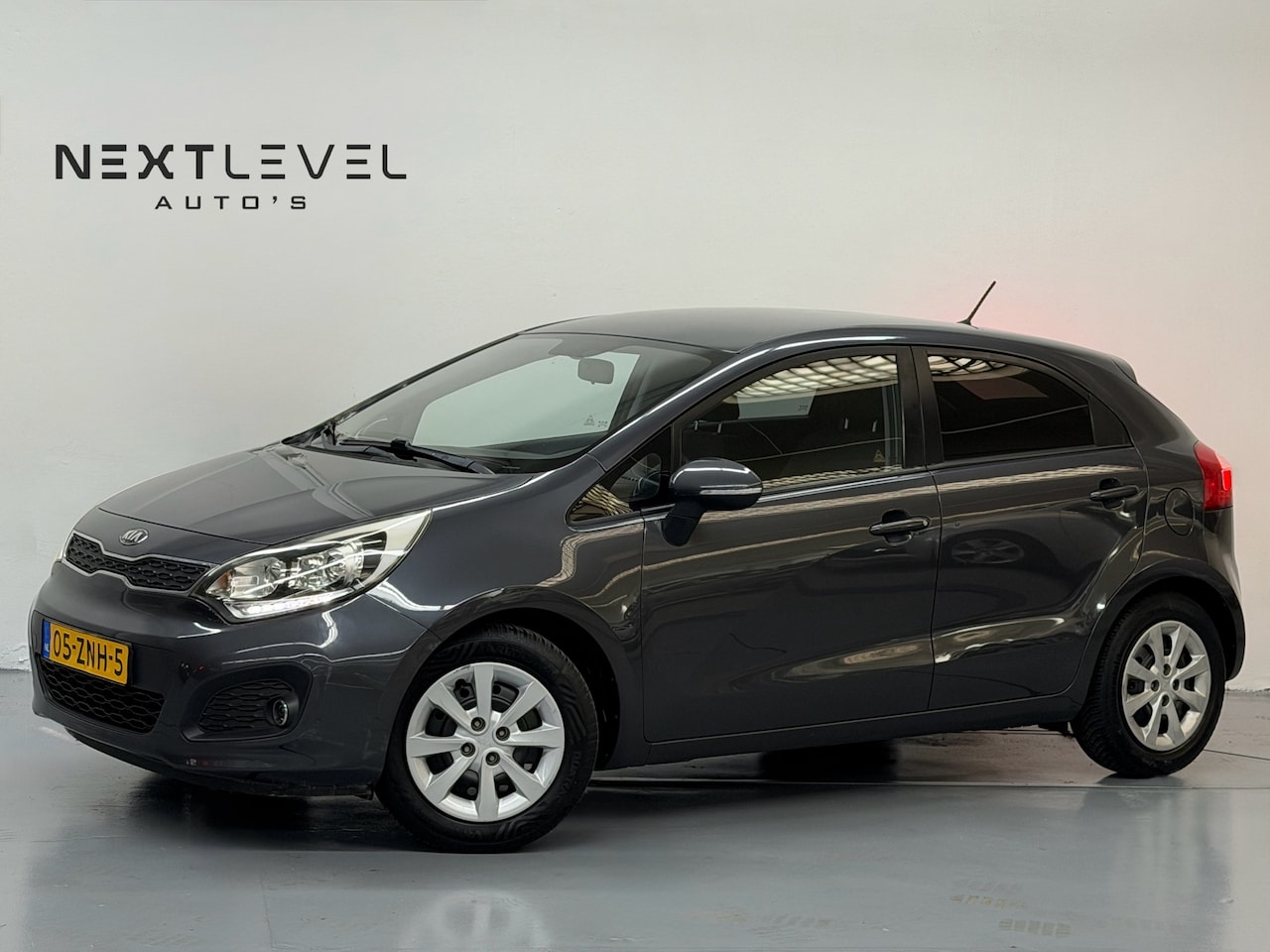 Kia Rio - 1.2 CVVT Design Edition Ondh Boekje Cruise Airco - AutoWereld.nl