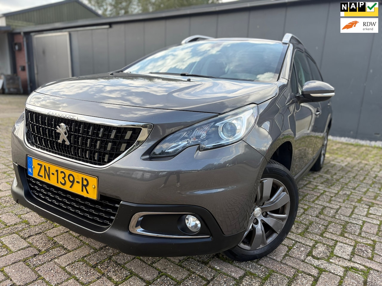 Peugeot 2008 - 1.2 PureTech Blue Lion 2e EIG/Dealer odh/Pano! - AutoWereld.nl