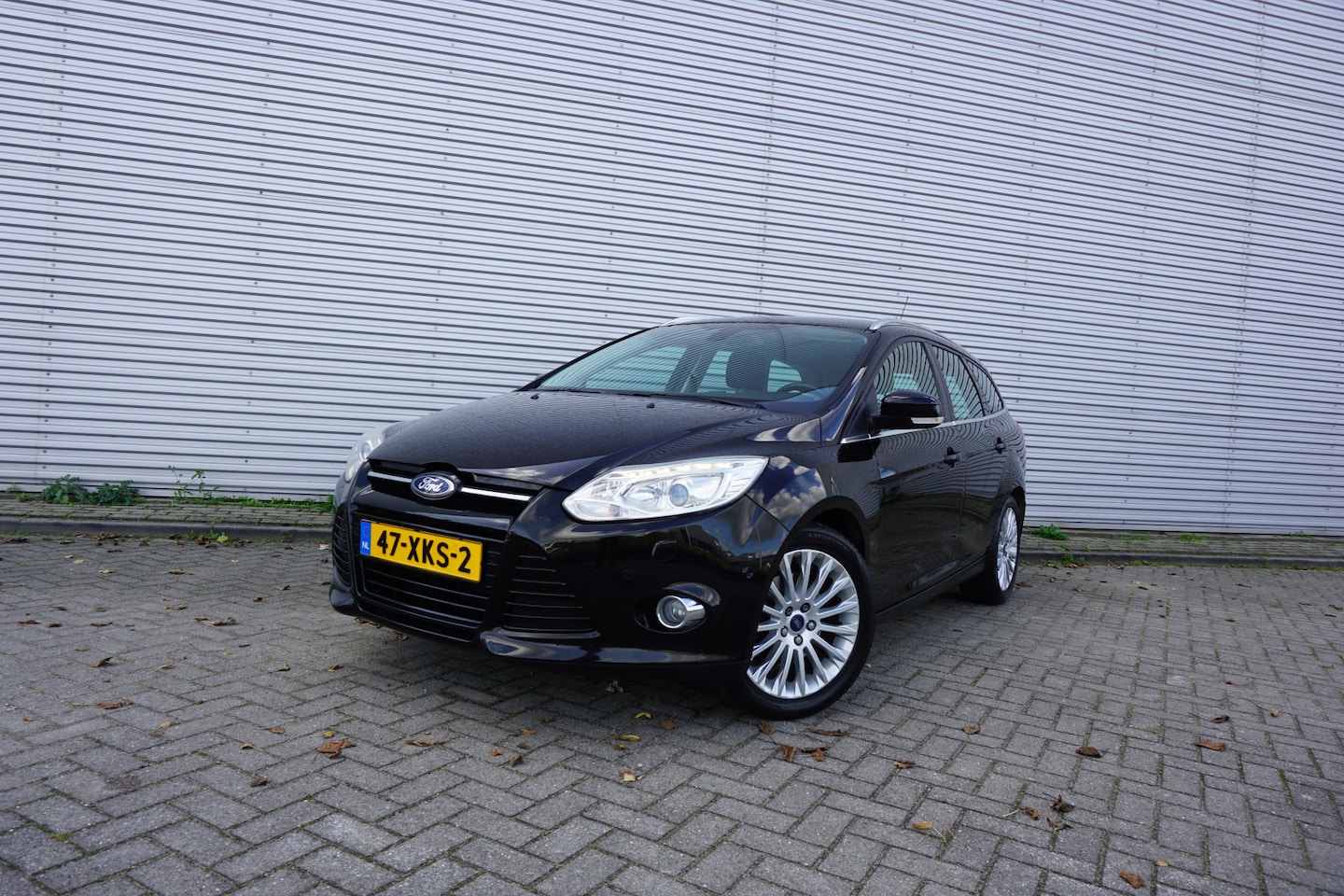 Ford Focus Wagon - 1.6 EcoBoost Lease Titanium Airco / Navi / Cruise / Elektr. ramen / Parkeers. / Trekhaak / - AutoWereld.nl