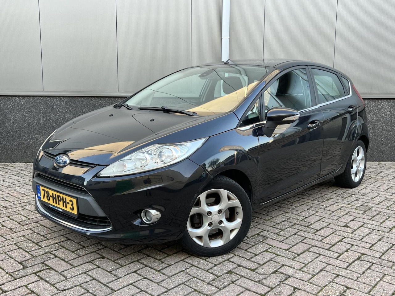 Ford Fiesta - 1.25 Titanium Cruise Climate Parksensor NAP - AutoWereld.nl