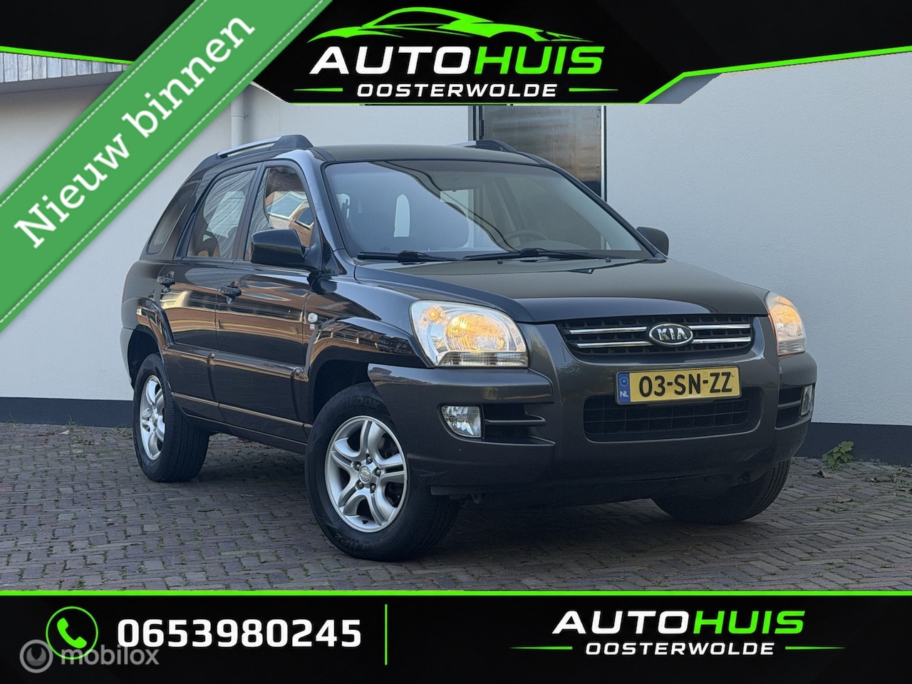 Kia Sportage - 2.0 CVVT | nieuwe apk | cruise | airco | pdc - AutoWereld.nl
