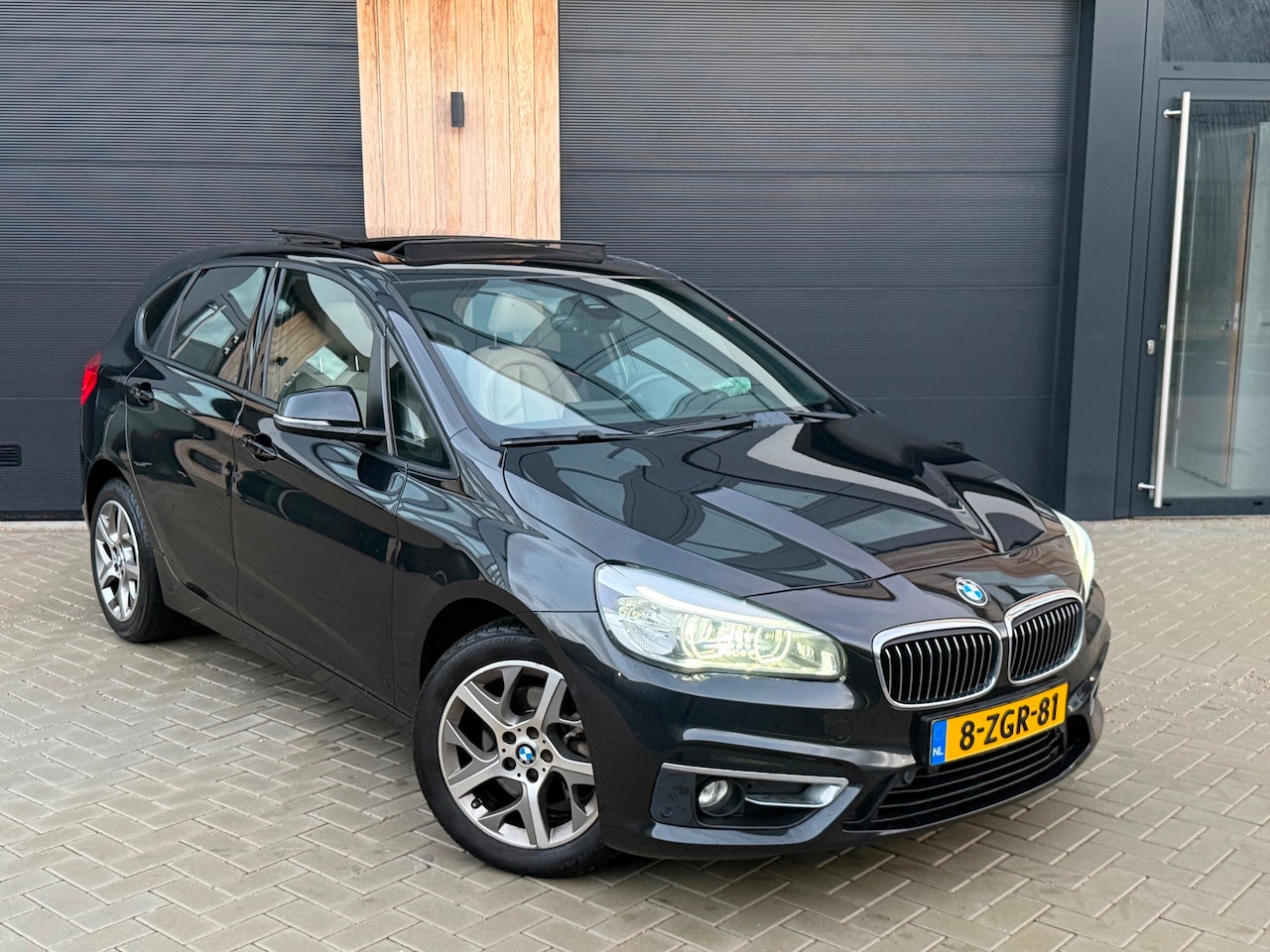 BMW 2-serie Active Tourer - 218i Executive (bj 2015) HuD|PANO|AUT|XENON|LEER - AutoWereld.nl