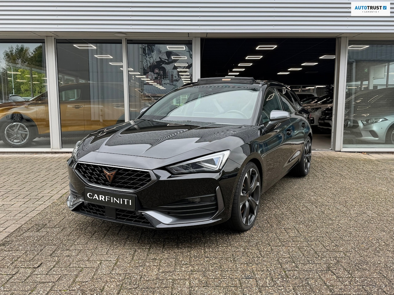 CUPRA Leon Sportstourer - 1.4 e-Hybrid 245 Pk Business | Panoramadak | Navigatie | Camera | Clima | Sportstoelen | K - AutoWereld.nl