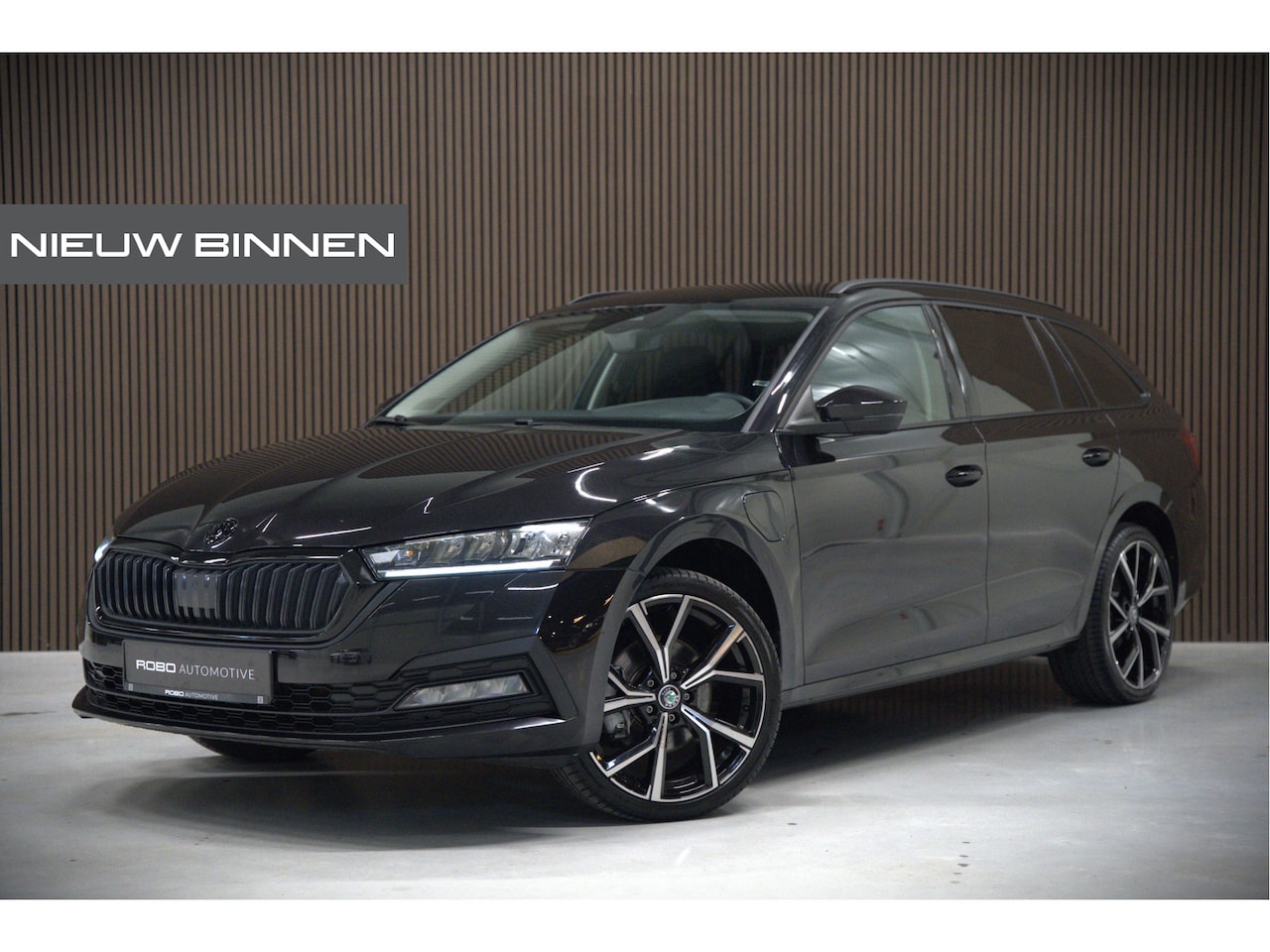 Skoda Octavia Combi - 1.4 TSI iV PHEV Ambition | Stuurverwarming | Stoelverwarming | Cruise Control | Apple Carp - AutoWereld.nl