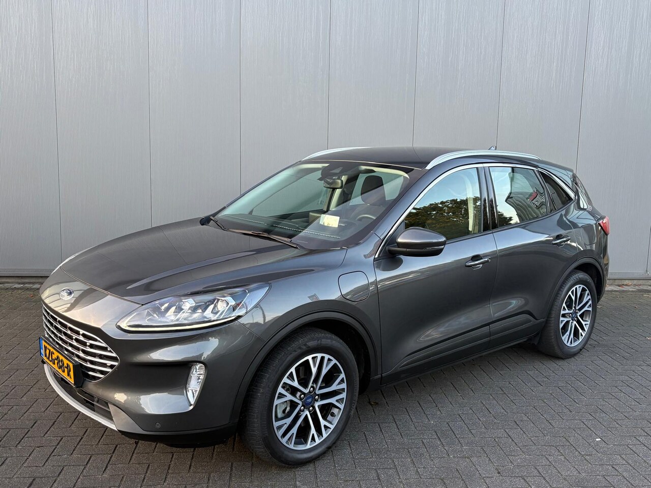 Ford Kuga - 2.5 PHEV Titanium Elektr.-trekhaak/Navigatie/Camera/Carplay-Android-auto - AutoWereld.nl