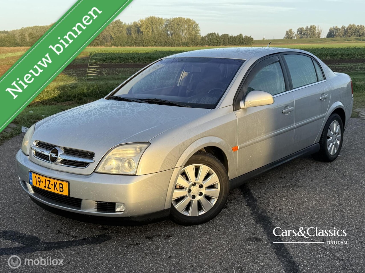 Opel Vectra - 2.2-16V Elegance 2.2-16V Elegance - AutoWereld.nl