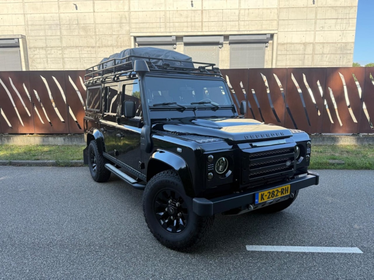 Land Rover Defender 110 - 2.4D 122pk SW 117.000km, Org. Roofrack met daktent - AutoWereld.nl