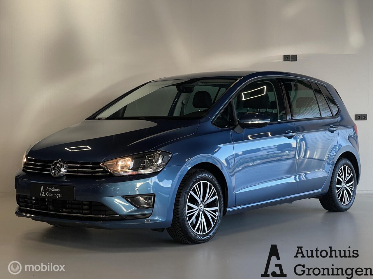 Volkswagen Golf Sportsvan - | Stoelverwarming | Cruise | Trekhaak | PDC V+A | 89.364 KM - AutoWereld.nl