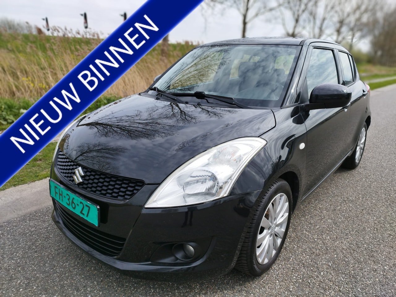 Suzuki Swift - 1.2 EASSS ** 5 drs ** Airco ** cruise control ** 132.712 km ** Key less ** 16 inch Lm velg - AutoWereld.nl