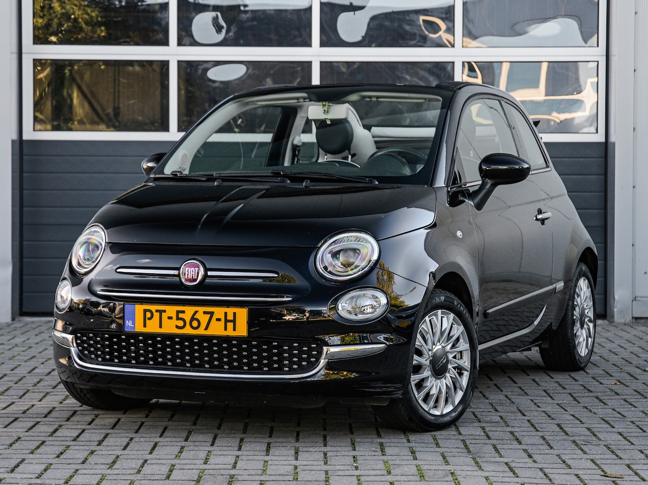Fiat 500 C - 0.9 TwinAir Turbo Lounge Cabrio | Navi | Airco | Cruise control | DAB+ | Bluetooth | Stuur - AutoWereld.nl