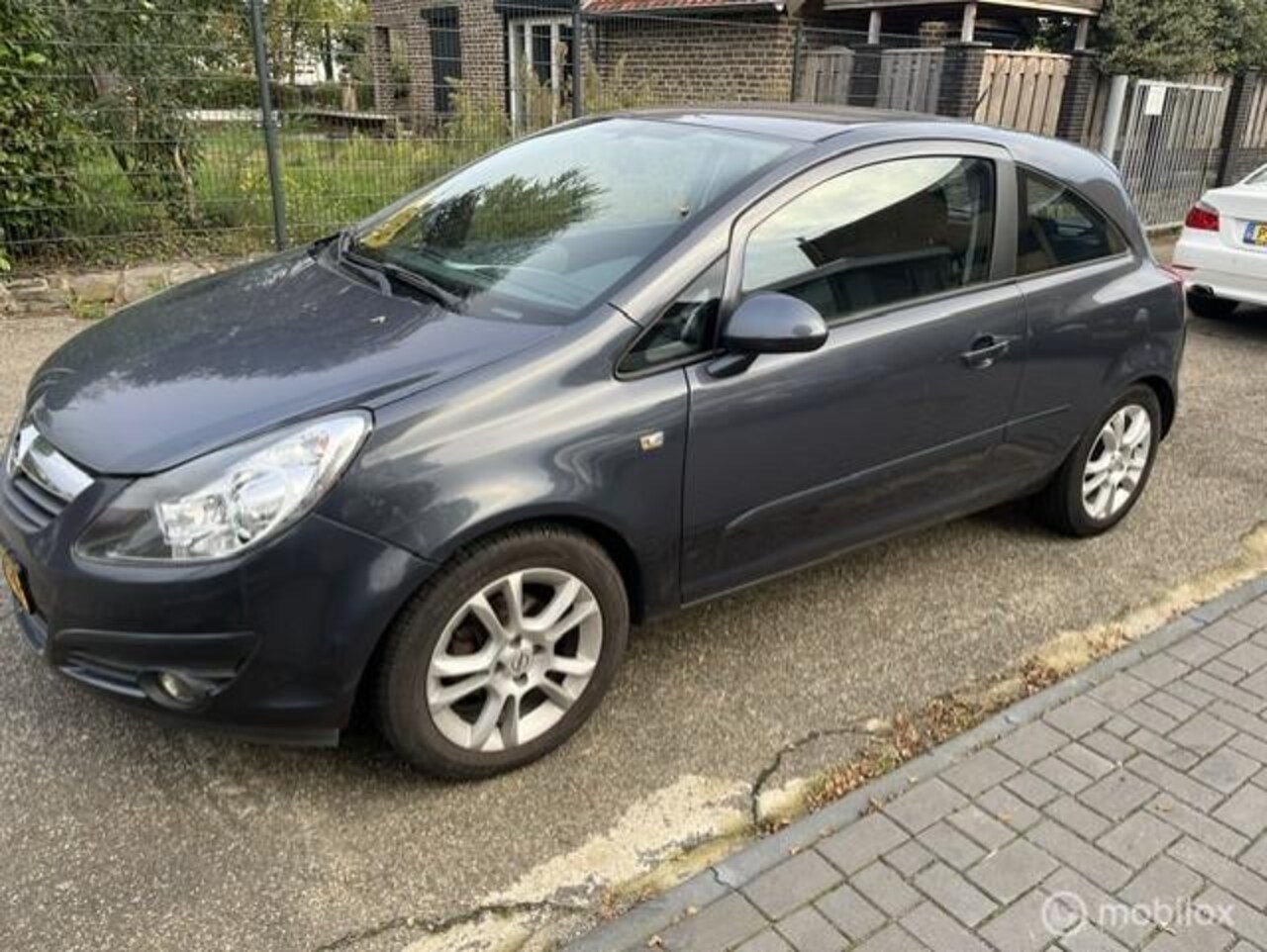 Opel Corsa - 1.4-16V Enjoy 1.4-16V Enjoy - AutoWereld.nl