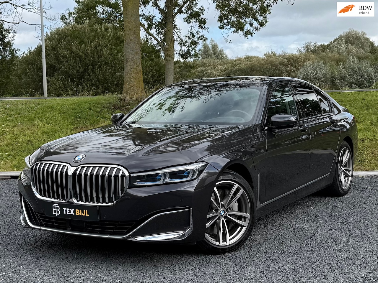 BMW 7-serie - 745e Pano/HUD/360cam/H&K/etc! - AutoWereld.nl
