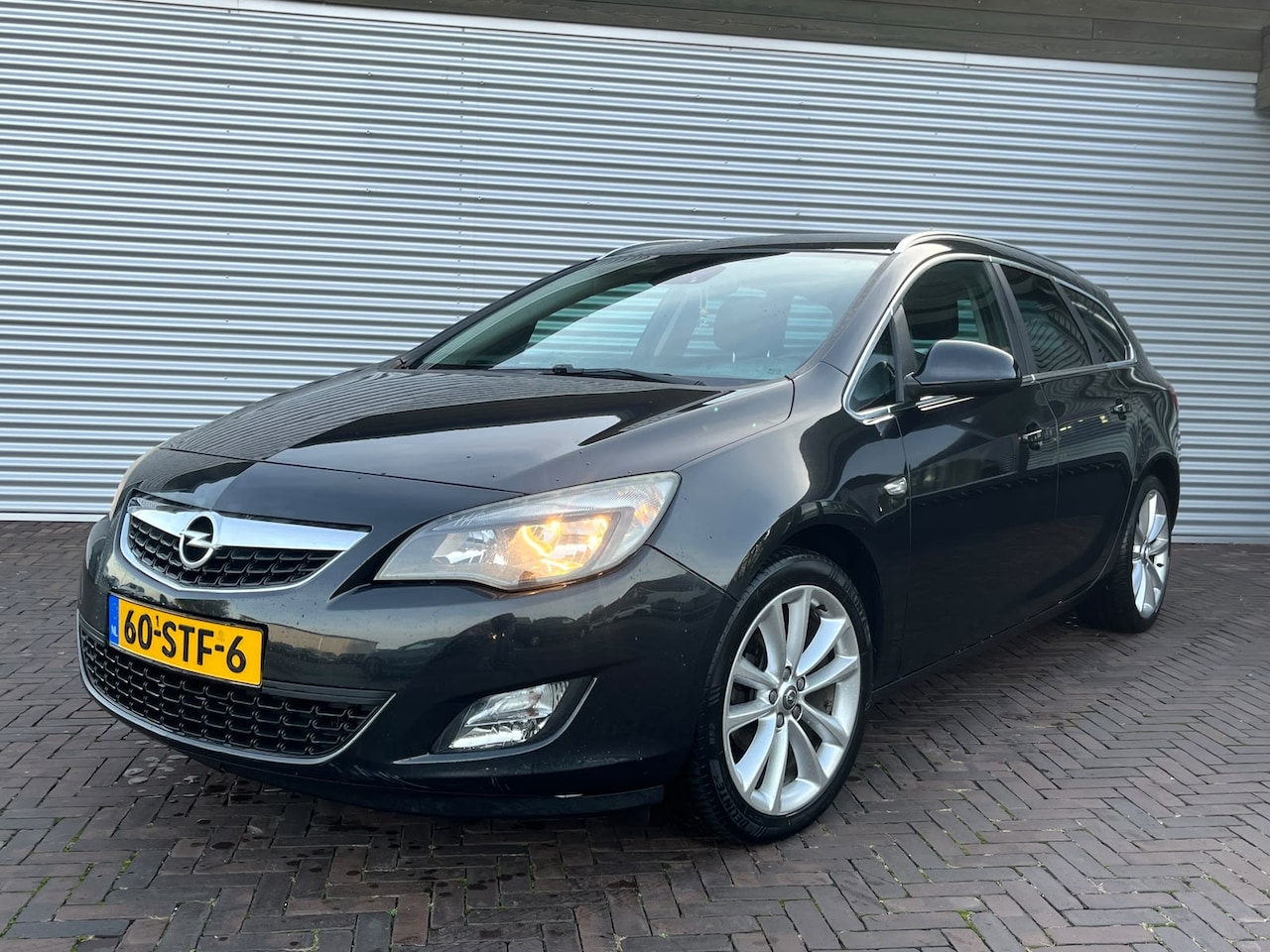 Opel Astra Sports Tourer - 1.4 Turbo Selection 1.4 Turbo Selection - AutoWereld.nl