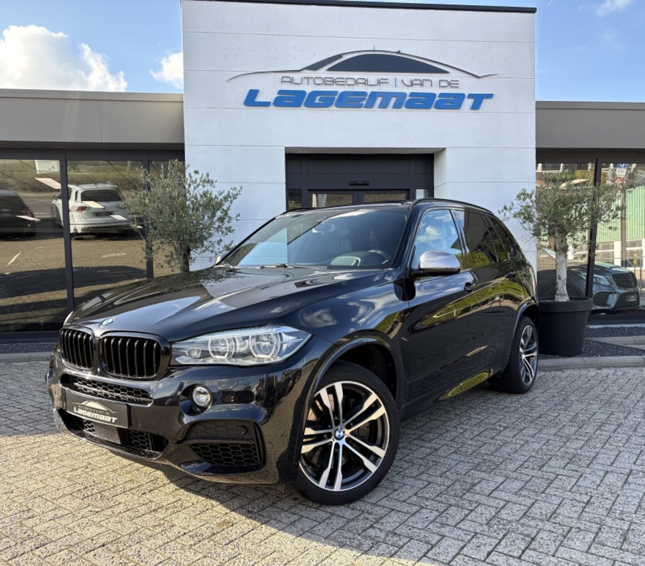BMW X5 - M50d | PANO | H&K | Trekhaak | Full option - AutoWereld.nl