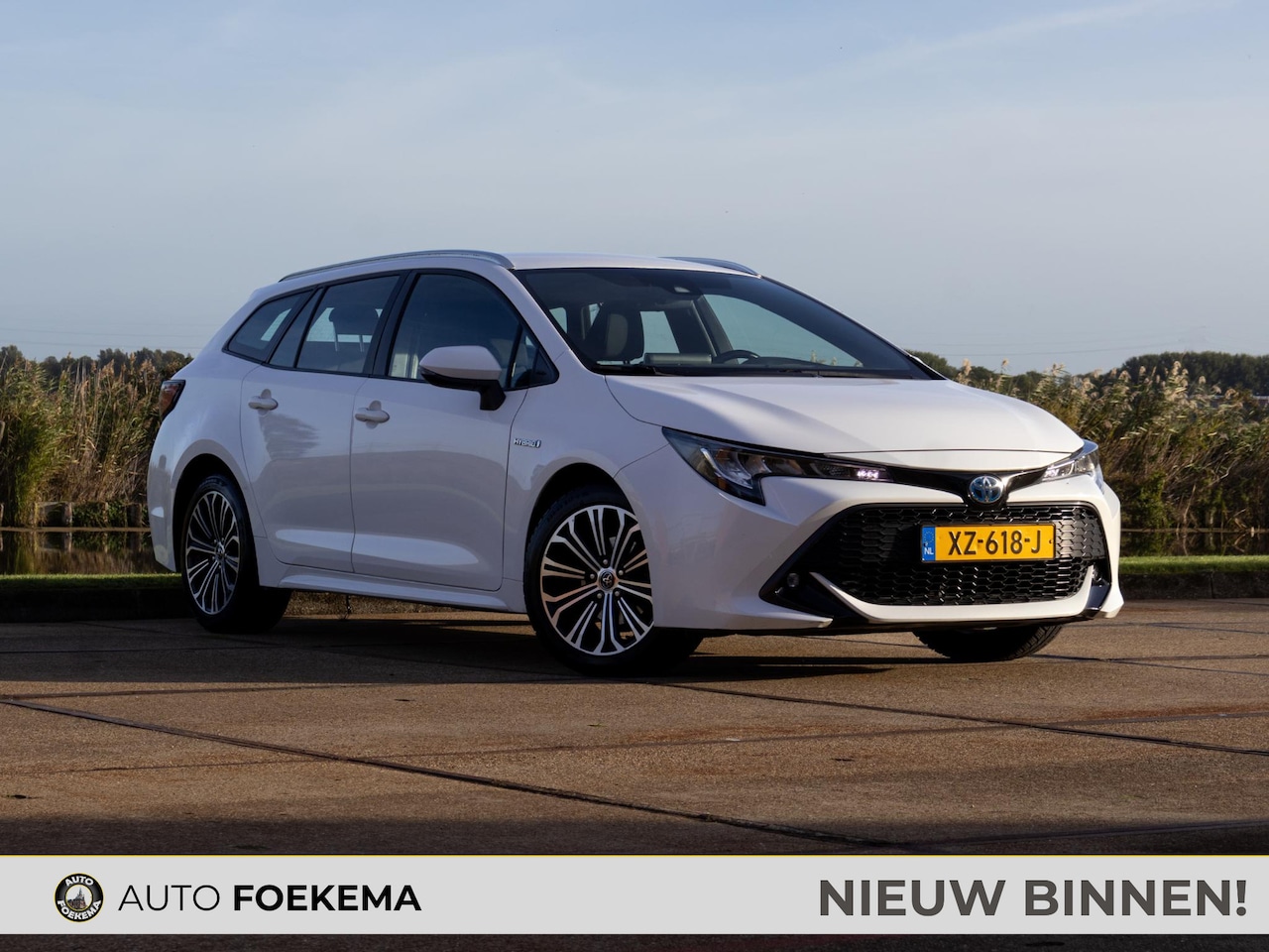 Toyota Corolla Touring Sports - 1.8 Hybrid First Edition 17" Camera LED - AutoWereld.nl