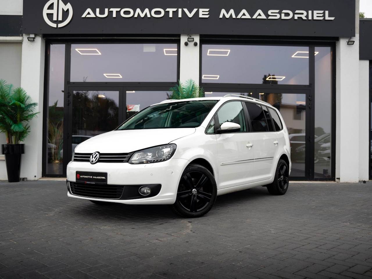 Volkswagen Touran - 1.4 TSI Comfortline EcoFuel 7p.Automaat|Camera - AutoWereld.nl