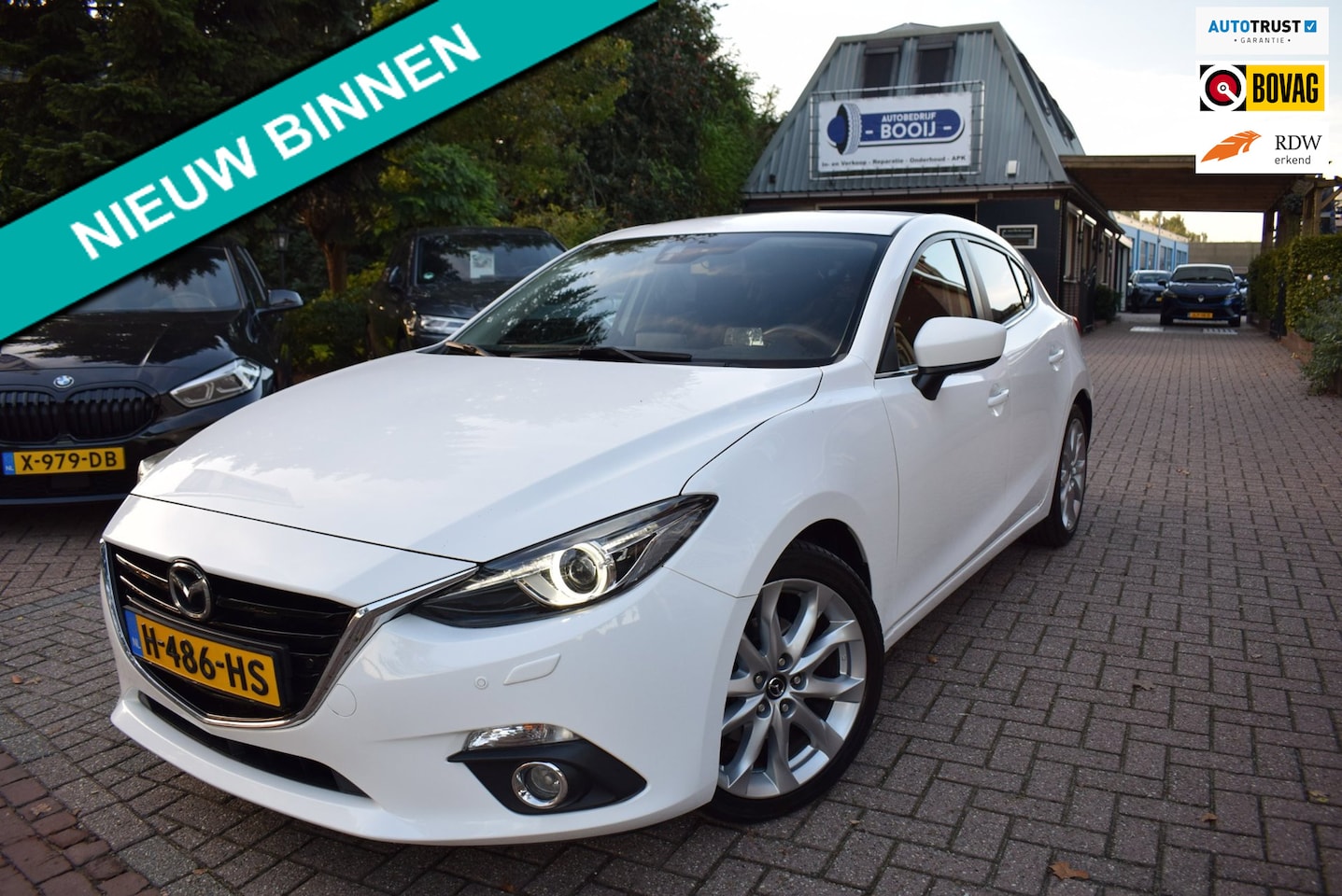 Mazda 3 - 2.0 TS+ CRUISE/NAVI/AIRCO ECC/BLUETOOTH/6 BAK/PDC V+A/TREKH/LMW 17 INCH/STOEL VERW/BOSE/US - AutoWereld.nl